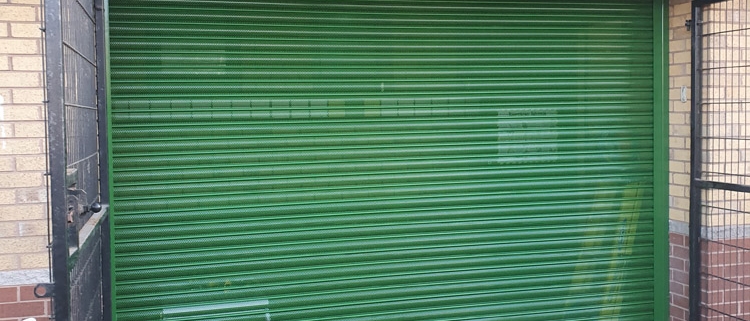 perforated green roller shutters Salford